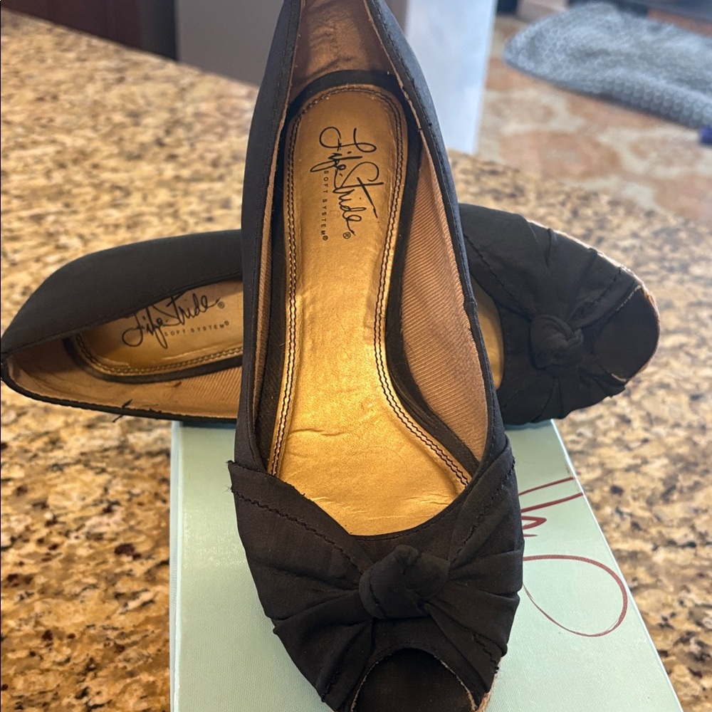 Women’s “Sam Edelman” style Black Espadrille Wedge with braiding detail.